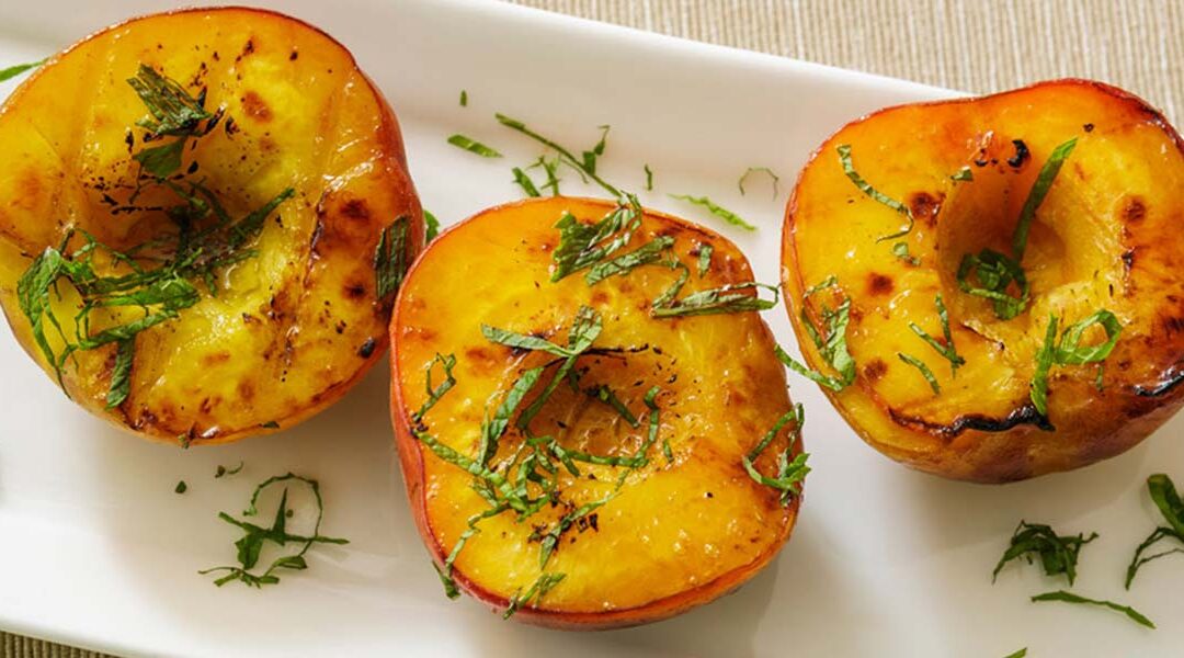 Grilled Peaches with Black Pepper and Basil-Lime Drizzle